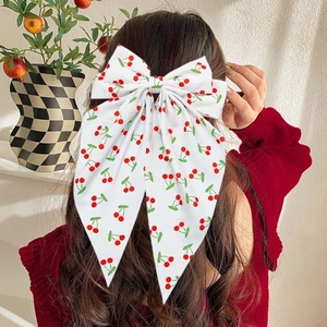 Oversized cherry print bow hair clip for women with elegant long fabric ribbons