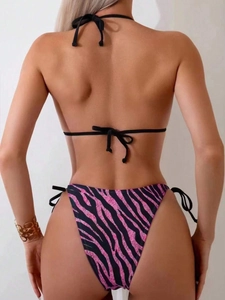 Detail of pink and black zebra print bikini bottom with side ties and back view
