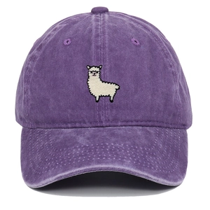 Close-up of purple washed cotton baseball cap featuring detailed white alpaca embroidery