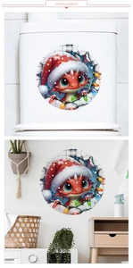 Detailed view of round Christmas cartoon dragon sticker on bathroom wall and toilet lid