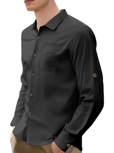 Close-up of linen-textured long sleeve shirt featuring chest pocket and button cuffs