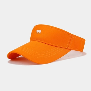 Detail of bear embroidery on orange sun visor hat with premium cotton canvas texture