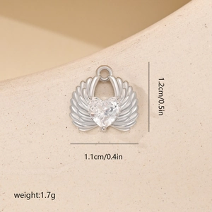 Detail of silver heart angel wing pendant with white zircon and size measurements