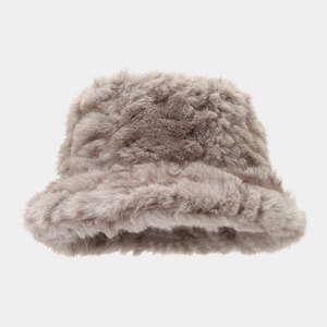 Detailed texture of thick warm faux mink fur on a light brown winter bucket hat for women
