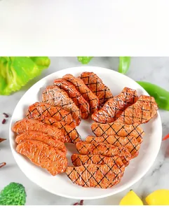 Detailed view of realistic PVC roasted beef steak models on a white ceramic plate