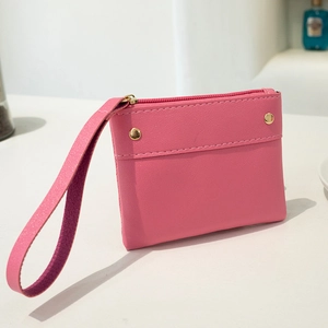 Pink PU leather coin purse with zipper closure and wrist strap for 2024 daily commuting