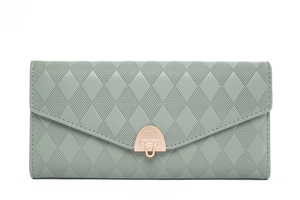 Detailed view of the mint green PU leather wallet featuring quilted texture and gold clasp