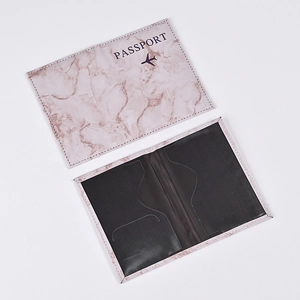 Detail view of pink marble PU leather passport holder showing interior slots and cover
