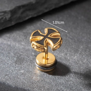 Macro detail of gold cross earring with black enamel and 1.01cm diameter measurement