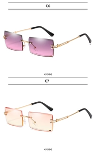 Close-up of frameless rectangular sunglasses in purple and orange gradient lenses