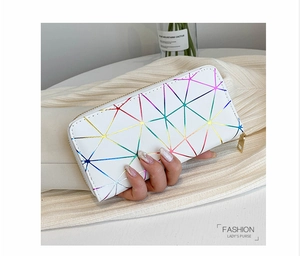 Detail of white women long wallet with colorful gradient geometric triangle patterns