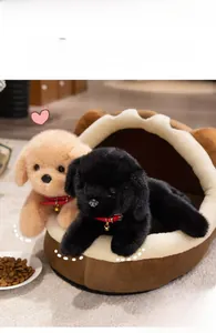 Plush Labrador puppies in a cozy brown dog bed with soft fleece lining and bell collars