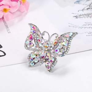 Vintage crystal butterfly brooch with colorful AB rhinestones on a silver base
