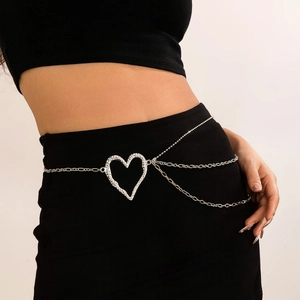 Detail of silver heart pendant body chain on model showing multilayer metal style