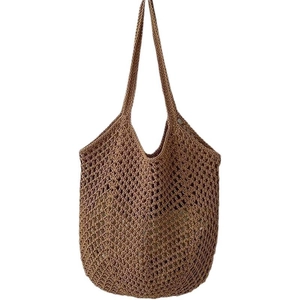 Brown woven cotton thread tote bag with hollow grid pattern for beach vacation use