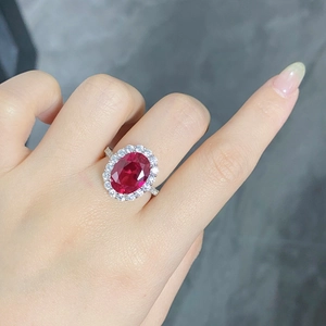 Elegant S925 sterling silver ring with large oval red gemstone and white accents