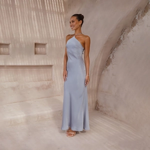 Detail of light blue backless satin halter dress featuring an elegant slim fit silhouette