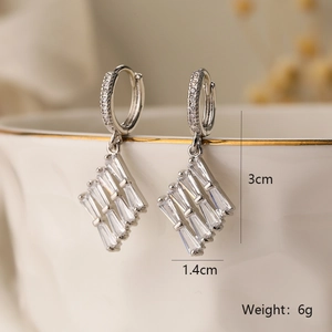 Detail of silver zircon heart earrings showing 3cm length and 1.4cm width dimensions