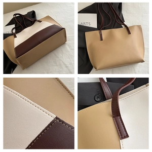 Detailed views of a minimalist two-tone tote bag showing fine stitching and leather texture