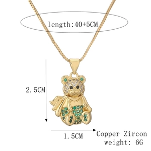 Detailed view of bear pendant size 2.5x1.5cm with gold plating and zircon stones