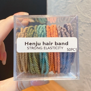 Vue détaillée de 50 élastiques à cheveux haute élasticité en boîte, couleurs variées
