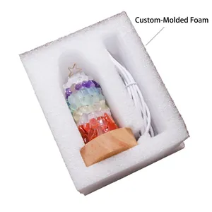 Rainbow crystal night light with wooden base and USB cable in secure foam packaging