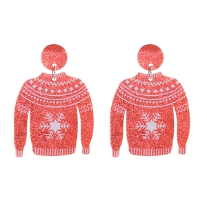 Close-up of red Christmas sweater earrings with white snowflakes and glitter details