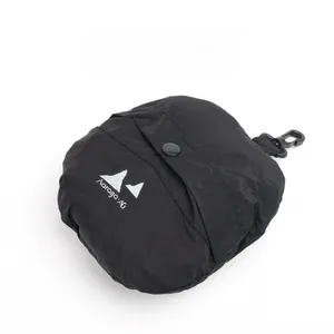 Detail of a foldable black nylon pouch with hook and Aorogo logo for outdoor storage