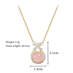 Detailed view of pink gemstone necklace with bow design and precise size dimensions