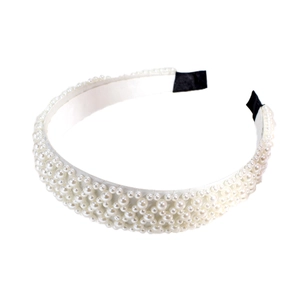 Elegant Baroque pearl headband with white wide fabric and black ends on white background