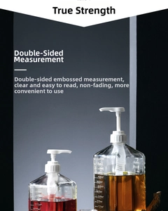 Detailed view of a 1100ml square glass bottle with precise measurement markings and pump