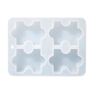 Vista dall'alto di uno stampo in silicone a 4 cavità per puzzle fai-da-te e resina