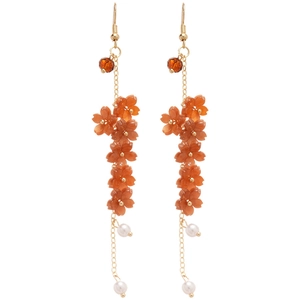 Elegant orange resin flower tassel earrings with white pearls and gold chains