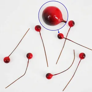 Close-up of artificial red berries for DIY Christmas wreaths and holiday decorations