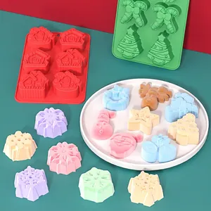 Christmas silicone baking mold set with Santa and snowman shapes in red and green colors