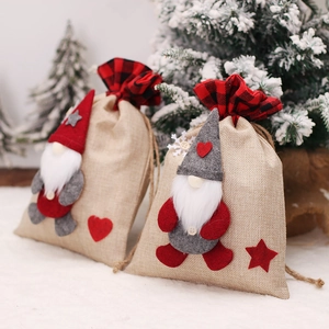 Christmas burlap gnome gift bags with drawstring closure and 3D plush forest man design