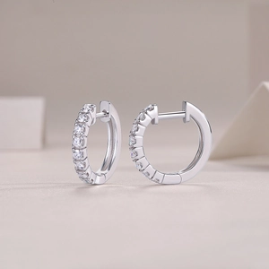 Elegant S925 sterling silver hoop earrings featuring sparkling pave cubic zirconia stones