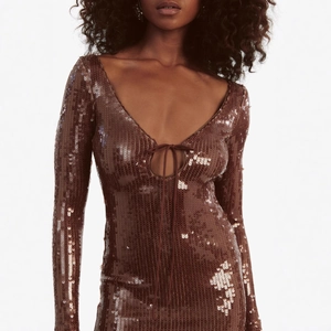 Slim fit sequin mini dress with deep V-neck and long sleeves in metallic bronze