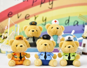 Detail view of five plush teddy bears in police, nurse and traffic officer uniforms.