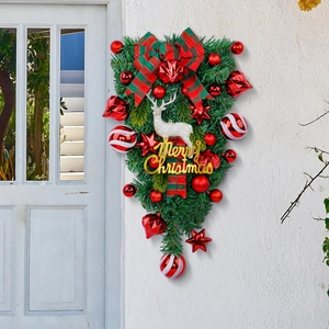 Christmas teardrop wreath with red bow, white reindeer, and Merry Christmas sign