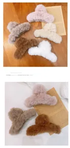Macro detail of plush faux fur hair claw clips in warm pink and brown earthy tones