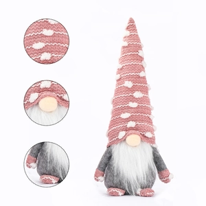 Detailed views of pink knit Christmas gnome showing fabric texture and plush beard