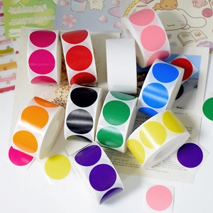 Bulk colorful round adhesive label rolls for organizing and sealing in multiple vibrant colors