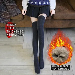 Thick dark grey over-knee socks with thermal terry lining for winter warmth