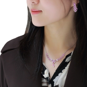 Luxury pink oval gemstone necklace and earrings set with micro-paved sparkling diamonds