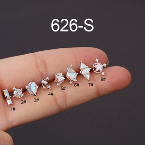 Macro shot of 20G stainless steel ear studs with iridescent AB zircon stones