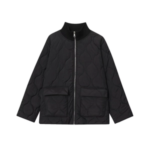 Women's black quilted jacket featuring a stand collar and oversized flap pockets
