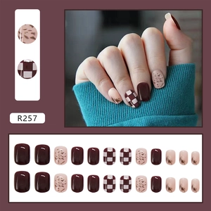 Detailed view of 24pcs retro brown checkerboard and marble pattern press-on nails