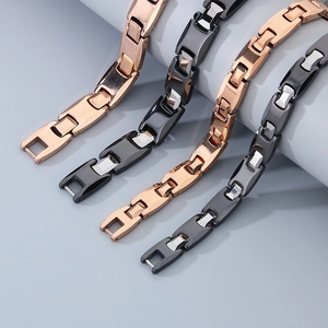 Detailed view of tungsten steel bracelets in rose gold and black finish with magnetic links