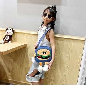 Toddler wearing a cute blue canvas crossbody bag with a funny burger character design